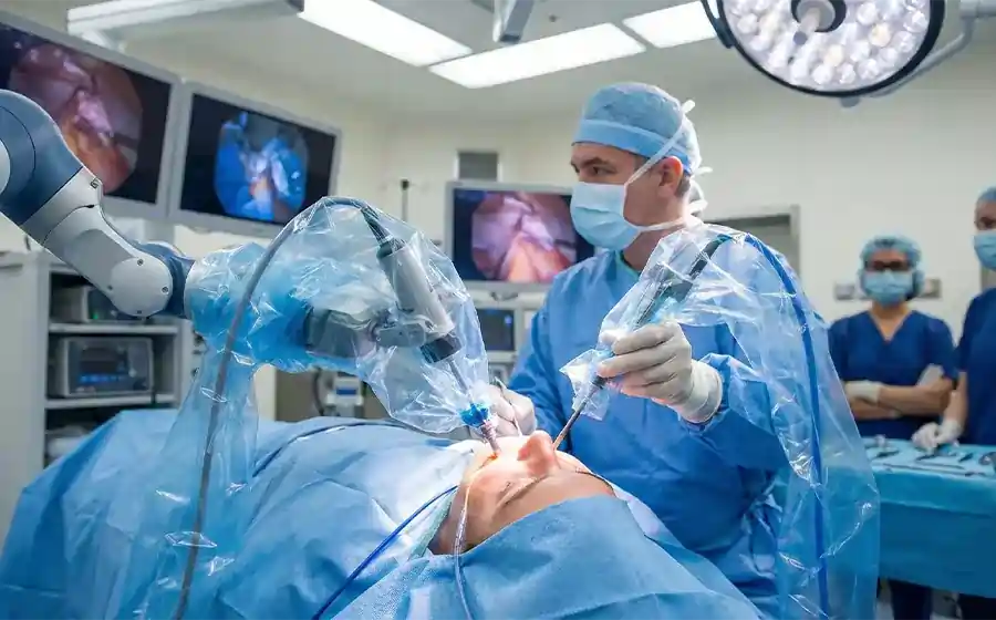 Surgeon performing robot-assisted plastic surgery using AI and advanced imaging technology in an operating room.