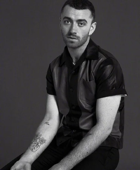 Sam Smith sharing insights on body image, confidence, and cosmetic surgery awareness