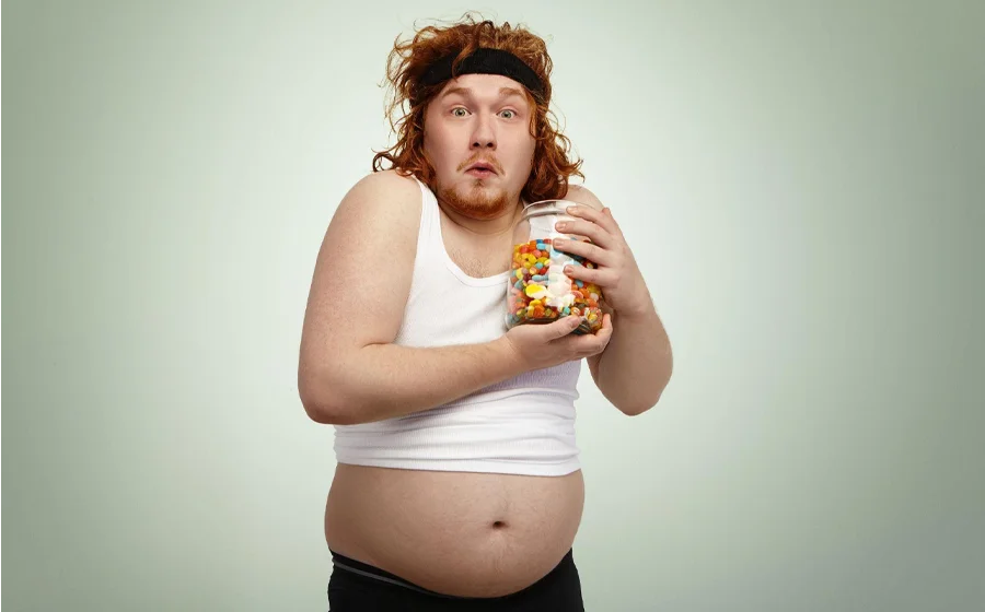 Why Millennials in Bangalore Are Choosing Liposuction: The New-Age Approach to Body Confidence 2 Young man with stubborn belly fat showing lifestyle challenges that make millennials consider liposuction in Bangalore