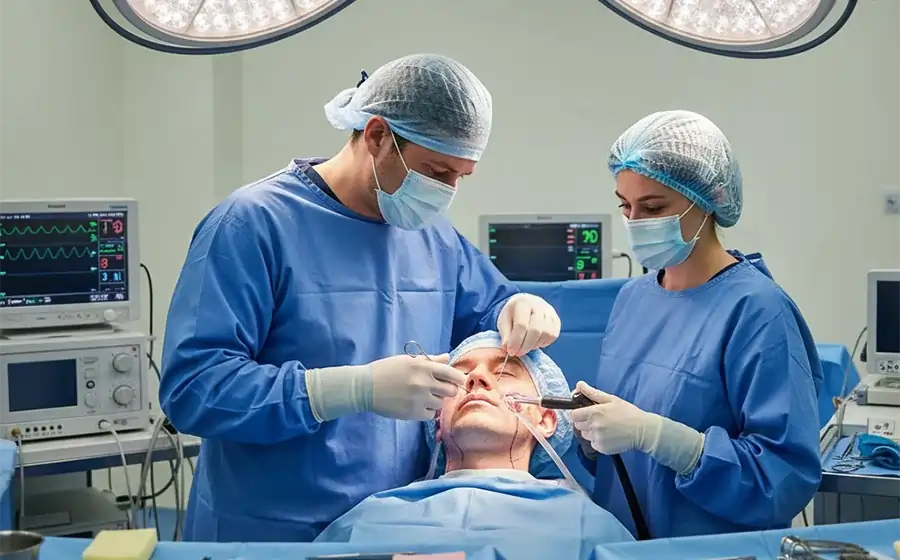 Surgeons performing facelift surgery procedure in Bangalore clinic