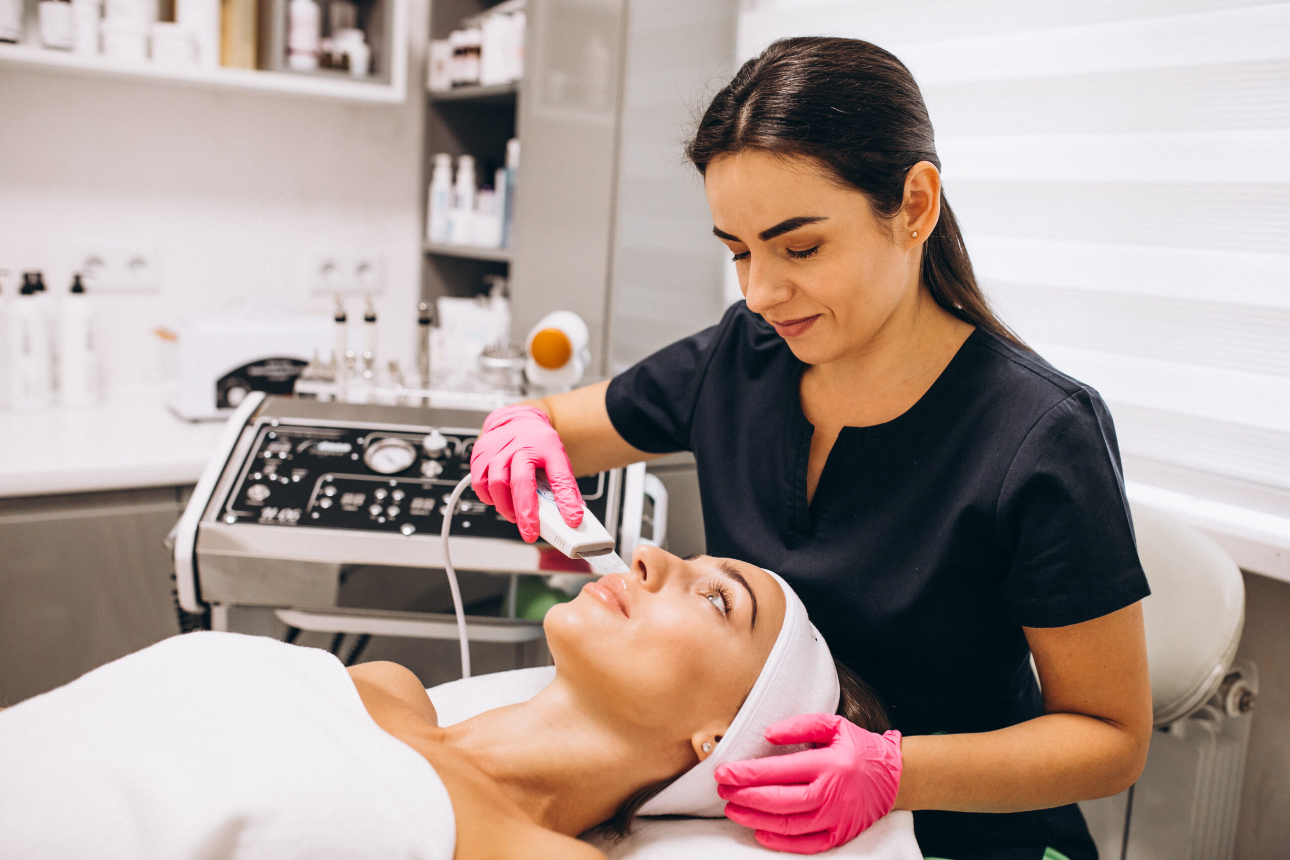 woman making beauty procedures beauty salon scaled