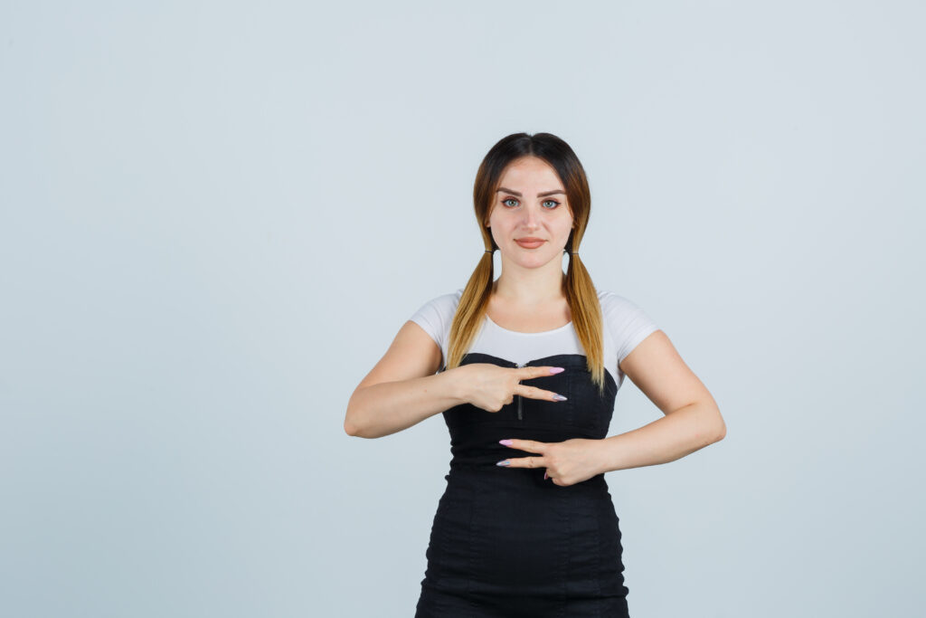 blonde young lady dress gesturing isolated 1