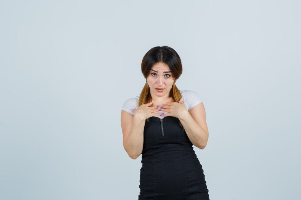 blonde young lady dress gesturing isolated.jpg