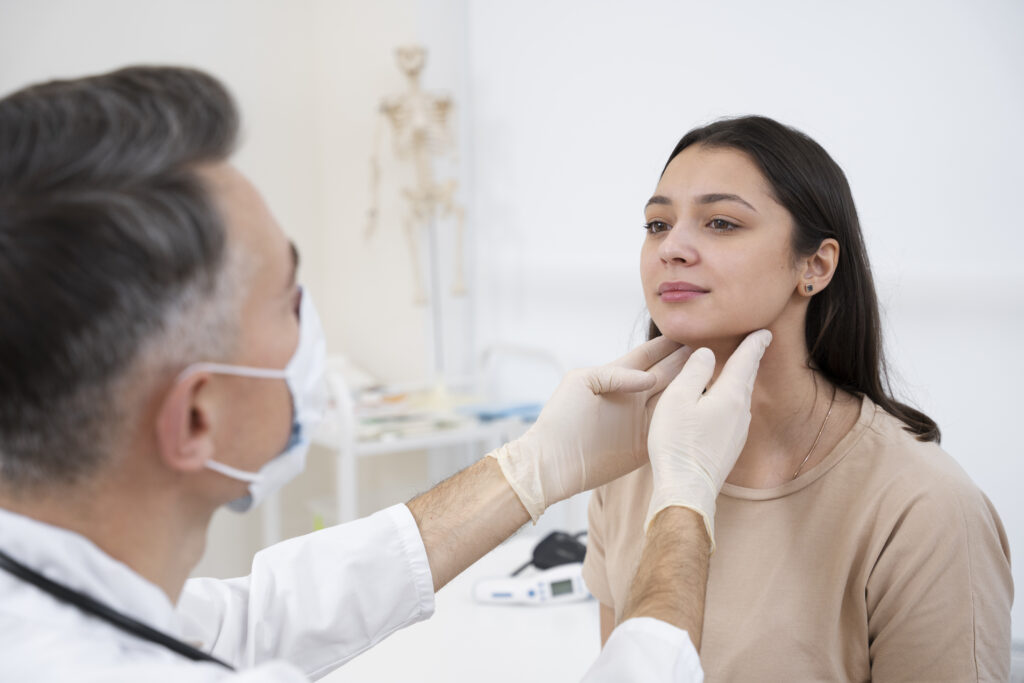 Kybella vs Liposuction: Which Works Better for Double Chin? 5 doctor performing routine medical checkup