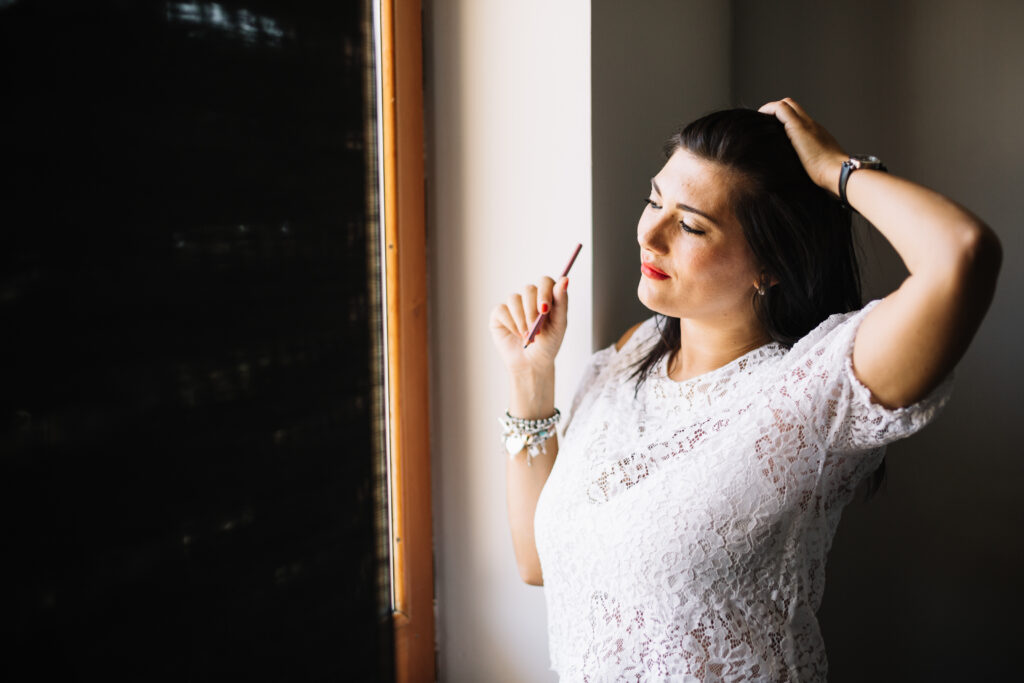 elegant woman posing dreamily