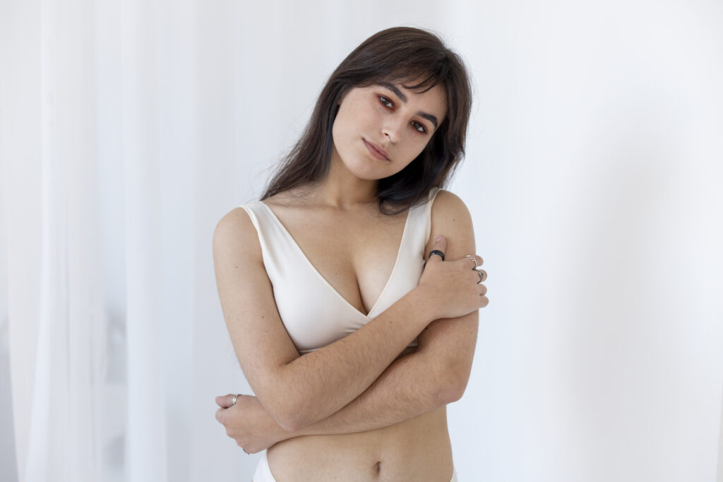Breast Reduction Surgery Cost in India: Why Prices Differ So Much Between Clinics in 2026 2 medium shot smiley woman posing