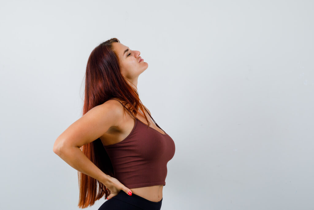 young woman with long hair brown crop top